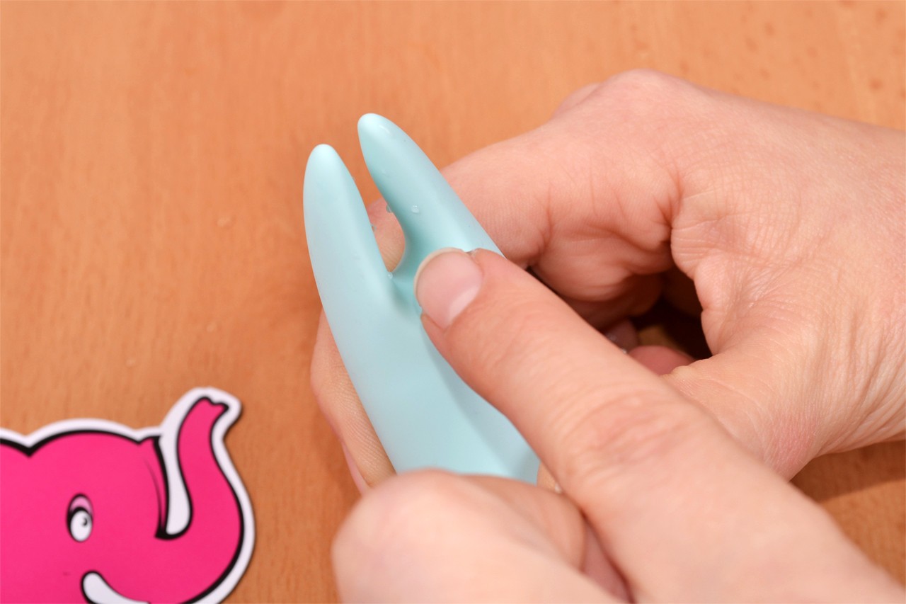 Тюркоазен диамантен масажен вибратор с уши