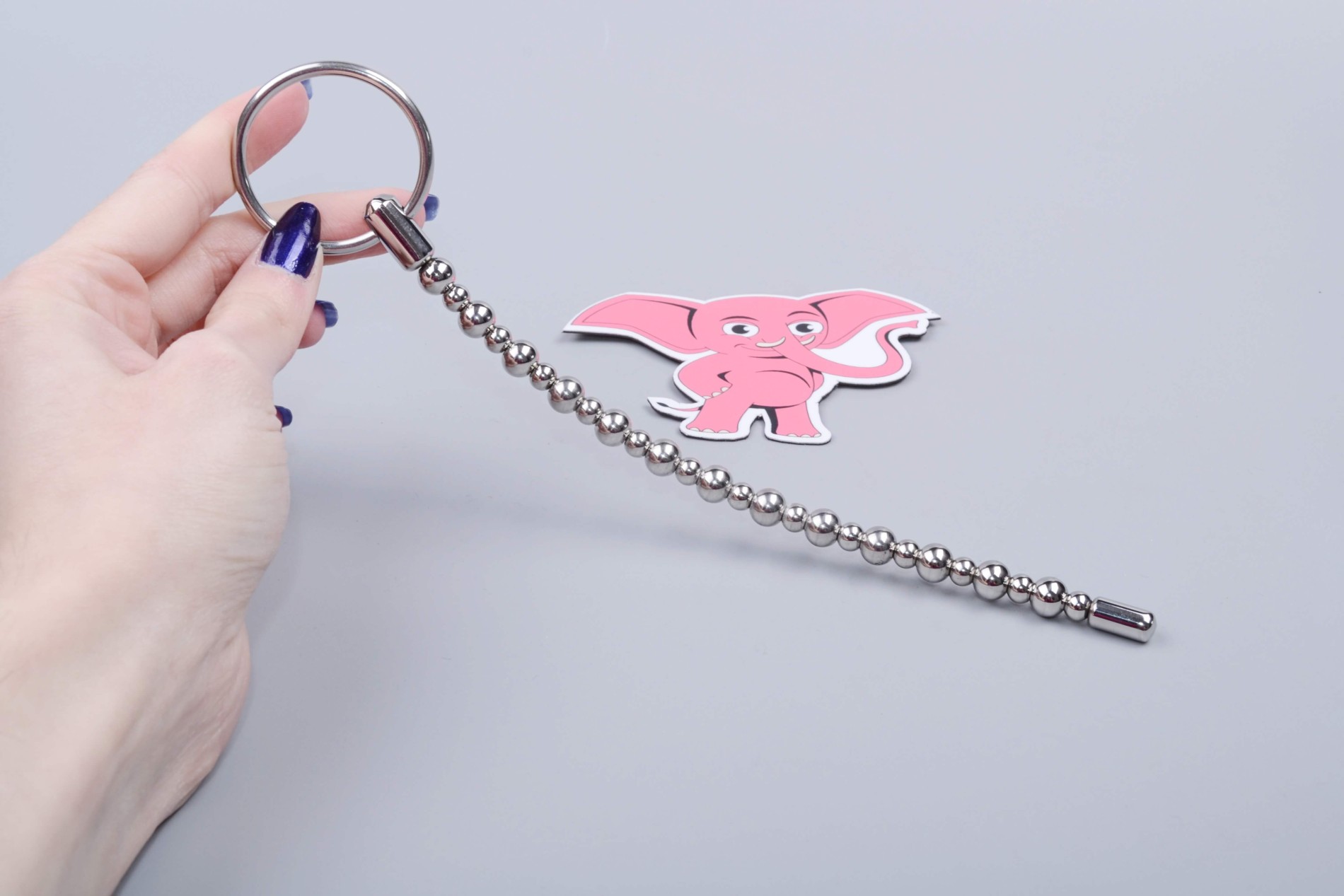 Гъвкав метален разширител Наниз от мъниста (8 mm), в ръка